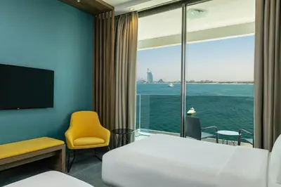 a hotel room with a view of the ocean at Aloft Palm Jumeirah in Dubai