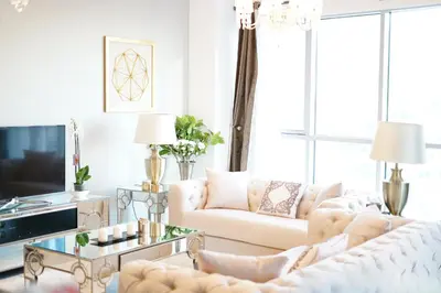 a living room with two couches and a tv at Elite Royal Apartment - Full Burj Khalifa & Fountain view - Opal - 2 bedrooms plus 1 open bedroom without partition in Dubai