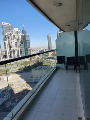 a balcony of a building with a view of a city at Dubai Downtown View in Dubai