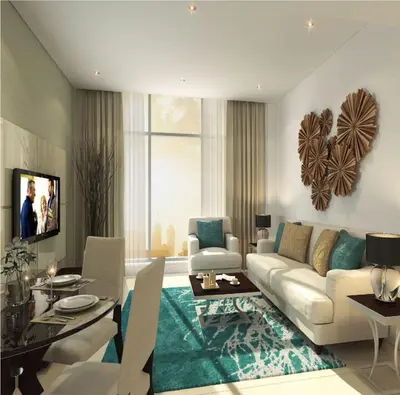 a living room with a couch and a table at Dubai Downtown View in Dubai