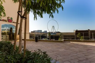 a view of a ferris wheel in the distance at ELAN Rimal 3 Suites in Dubai