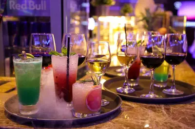 a group of wine glasses sitting on a table at Stella Di Mare Dubai Marina Hotel in Dubai