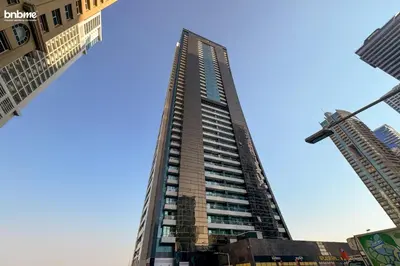 a tall building is under construction in a city at bnbmehomes - Gold Crest Views 2 in Dubai
