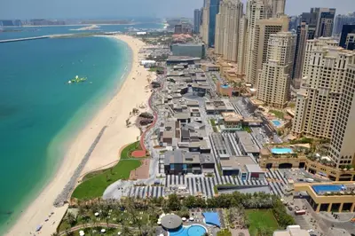 an aerial view of a beach and the ocean at Murjan Suites Waterfront Jumeirah Beach Residence The Walk & Dubai Eye & Beach & Marina in Dubai