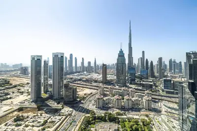 an aerial view of a city with tall buildings at 1BR Burj Khalifa View Index Tower DIFC in Dubai