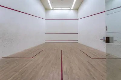 an empty room with a basketball court with a wooden floor at Divine Burj & Opera Views - 2BDR - DOWNTOWN DUBAI in Dubai