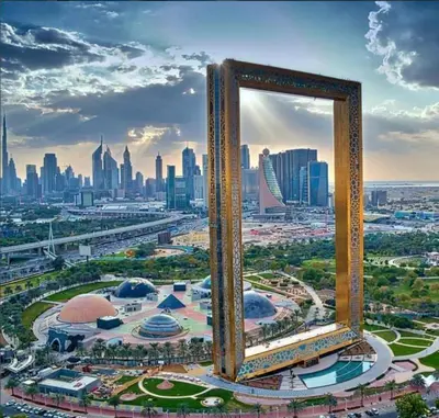 a view of a city with a frame in the foreground at Divine Burj & Opera Views - 2BDR - DOWNTOWN DUBAI in Dubai