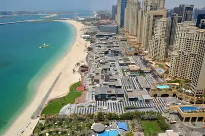 an aerial view of a beach and the ocean at Luxury Casa - Grand Sea View Apartment JBR Beach 2BR in Dubai