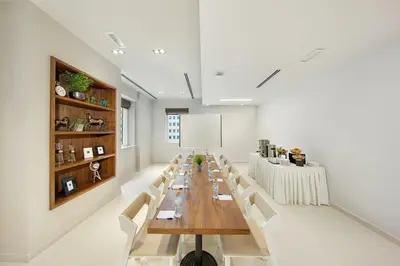 a large dining room with a long table and chairs at Citymax Hotel Al Barsha in Dubai