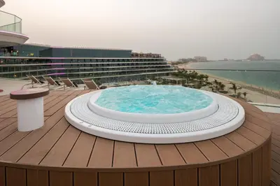 a hot tub on the deck of a cruise ship at W Dubai - The Palm in Dubai