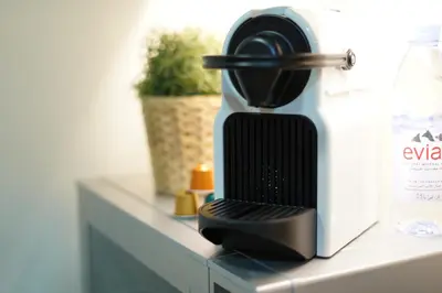 a hair dryer sitting on top of a counter at Elite Royal Apartment | Burj Residences Tower 5 | Gold in Dubai