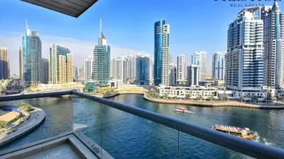 a view of a city with a river and buildings at Deluxe Studio for Rent at Marina View Towers in Dubai