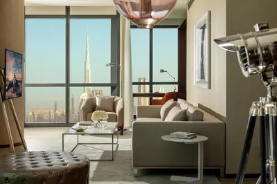 a living room with a couch and a table at Paramount Hotel Dubai in Dubai