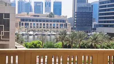 a view of a river in a city with buildings at Magic waves holiday in Dubai