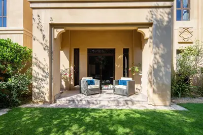 two chairs sitting in the entrance to a house at Frank Porter - Reehan 5 in Dubai