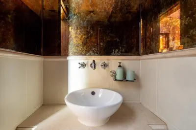 a bathroom with a white bowl sink in a room at Frank Porter - Reehan 5 in Dubai