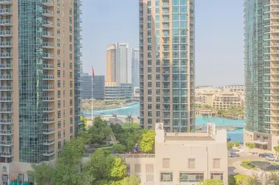 a view of a city skyline with tall buildings at Bella Vista - 29 Boulevard Downtown Burj Khalifa in Dubai