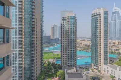 an aerial view of a city with tall buildings at Bella Vista - 29 Boulevard Downtown Burj Khalifa in Dubai
