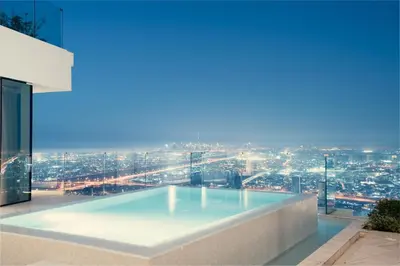 a large swimming pool on top of a building at FIVE Jumeirah Village in Dubai