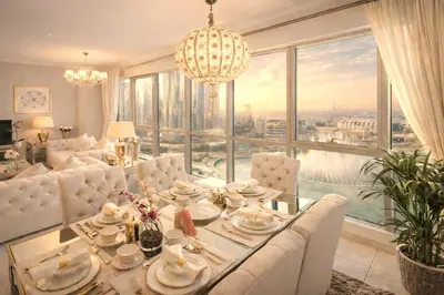 a living room with a table and a large window at Elite Royal Apartment - Full Burj Khalifa and Fountain View - The Royal in Dubai