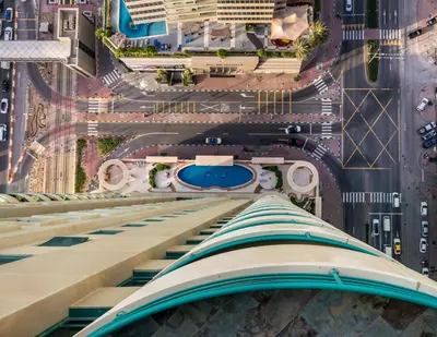 an aerial view of a tall building with a street at Masters and Double Rooms For Girls ONLY in Marina, Dubai in Dubai