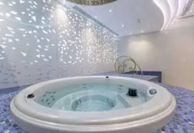 a bathroom with a bath tub with a toilet at Luton Vacation Homes -sea view -Damac Heights, Dubai Marina -90AB2 in Dubai