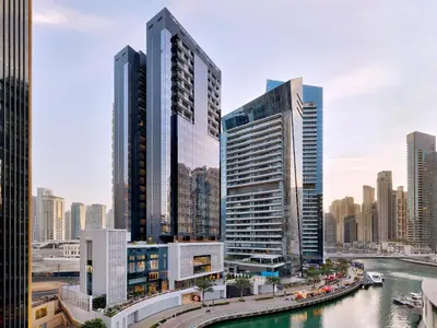 a city skyline with tall buildings and a river at Silverene Towers Dubai Marina - By Home Of Choice in Dubai