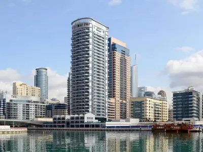 a city skyline with tall buildings and water at HiGuests - Spacious 1BR in Dubai Marina With Amazing Views in Dubai