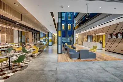 a rendering of a restaurant with tables and chairs at URBAN Al Khoory Hotel in Dubai
