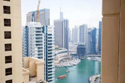 a view of a river in a city with buildings at Wonderful 2BD apartment near The Beach Sadaf JBR in Dubai