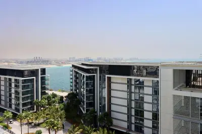 an aerial view of buildings and the ocean at Bluewaters Island - High-Floor 1 Bedroom Suite by Livbnb in Dubai