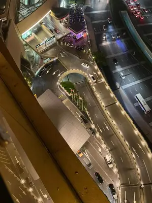 an overhead view of a busy city street at night at Address Dubai Mall Fashion Avenue 1 bedroom 34 floor in Dubai