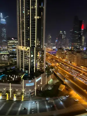 a view of a city at night with traffic at Address Dubai Mall Fashion Avenue 1 bedroom 34 floor in Dubai
