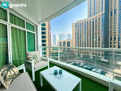 a balcony with a view of a city skyline at HiGuests - Deluxe Apartment With Balcony and Amazing Views in Dubai
