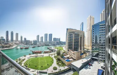 a view of a city with a river and buildings at 5 star Sparkle Tower by Swarovski, Dubai Marina in Dubai