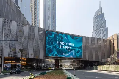 a large billboard in the middle of a city at Frank Porter - Mon Reve in Dubai