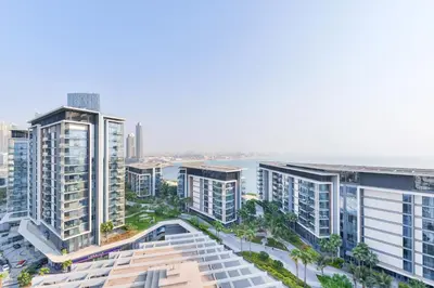 an aerial view of a city with tall buildings at Spectacular 3 BR condo with maids room facing the Dubai Eye in Dubai