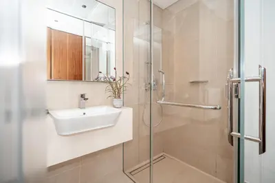 a bathroom with a sink and a shower at HiGuests - Unique Studio With Stunning Panoramic Marina Views in Dubai