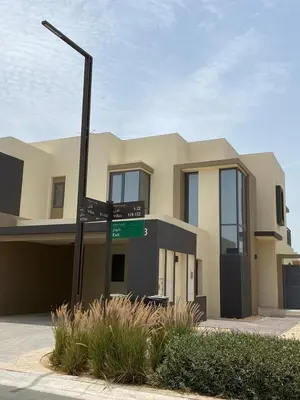a house with a street sign in front of it at 5 bedroom Villa - Dubai Hills in Dubai