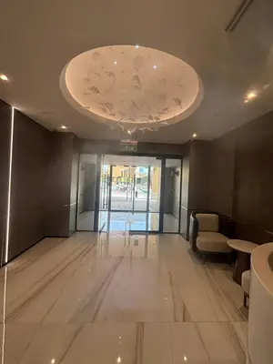 a lobby with a chandelier and a ceiling at Modern and new studio in Murjan, JBR in Dubai