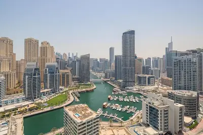 a view of a river in a city with buildings at Frank Porter - Studio One in Dubai