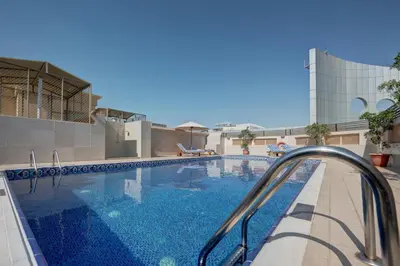 a swimming pool on top of a building at Radiance Premium Suites in Dubai