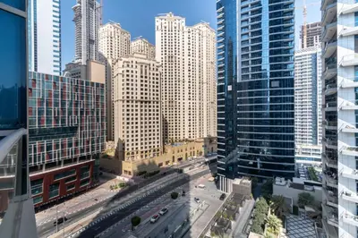 an aerial view of a city with tall buildings at The Smart Concierge - Bay Central in Dubai
