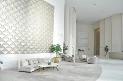 a living room with a couch and a table at Frank Porter - Burj Vista in Dubai