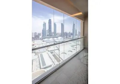 a balcony with a view of a city at Dubai Mall Residences -Luxury 1 bedroom in Dubai