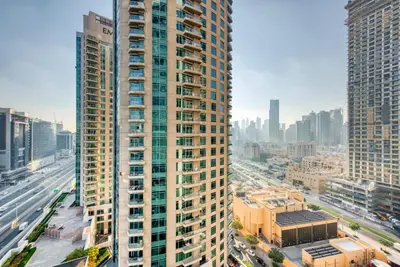 a view of a tall building in a city at RH- Perfect Downtown Getaway for Couple, Near Dubai Mall in Dubai