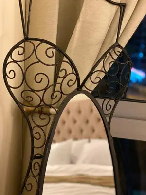 a close up of the back of a metal chair at Luxury 1br in Dubai Marina, ask for July Full month offer in Dubai