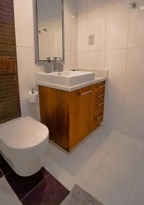 a bathroom with a toilet and a sink at Nasma Luxury Stays - Boulevard Central Tower in Dubai