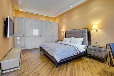a bedroom with a bed and a flat screen tv at Stunning 2BD sea view apartment in Jbr in Dubai
