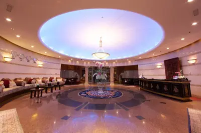 a large lobby with a large circular ceiling at Tamani Marina Hotel & Apartments in Dubai